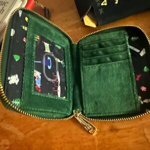 Loungefly Black and Red Elf Candy Cane Bag